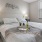 Bedroom with natural lighting and high ceilings