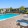 Resort-style swimming pool with lounge seating