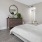 Bedroom with natural lighting and high ceilings